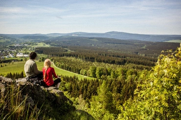 Hikers overlooking the Ore Mountains