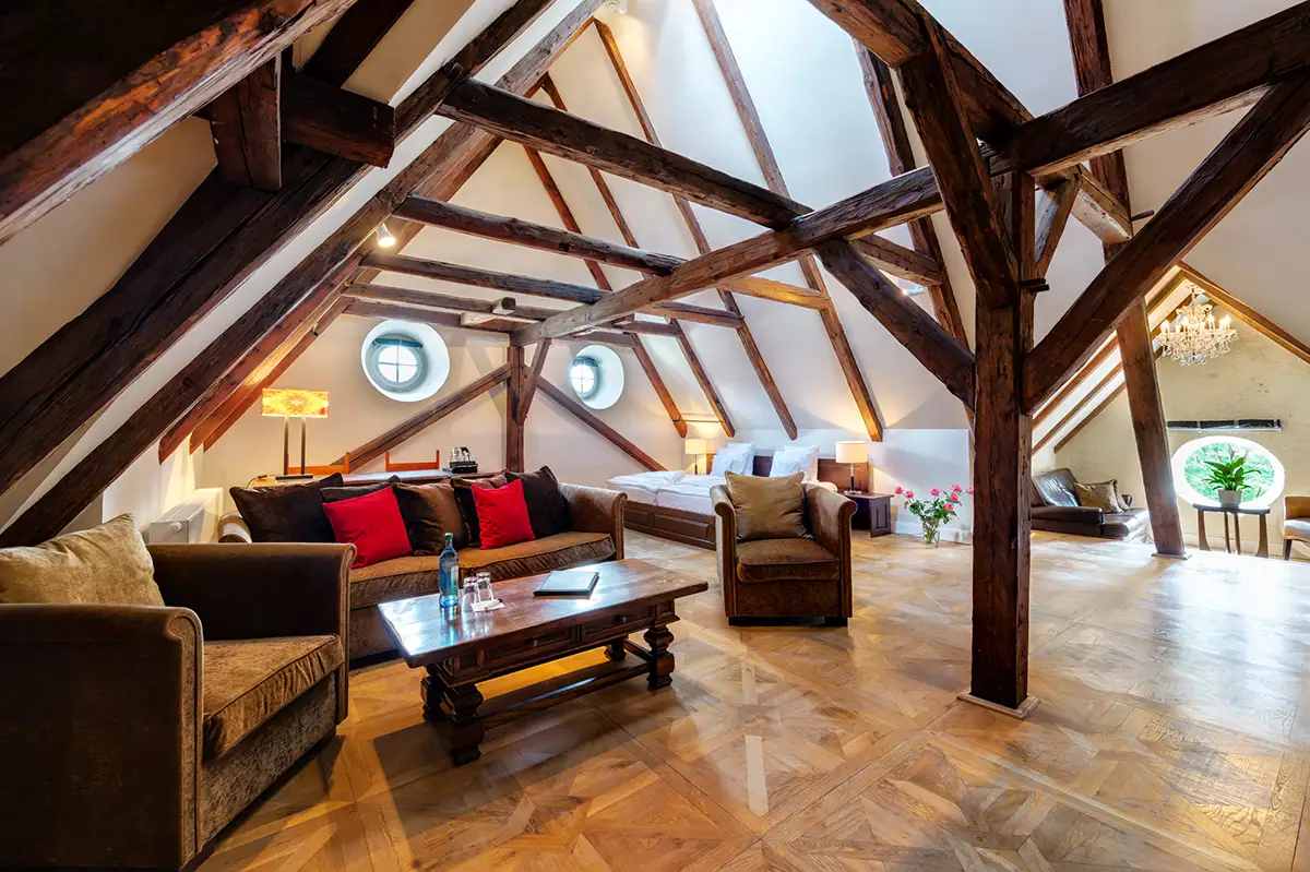 Living room beneath timber beams with coffee table